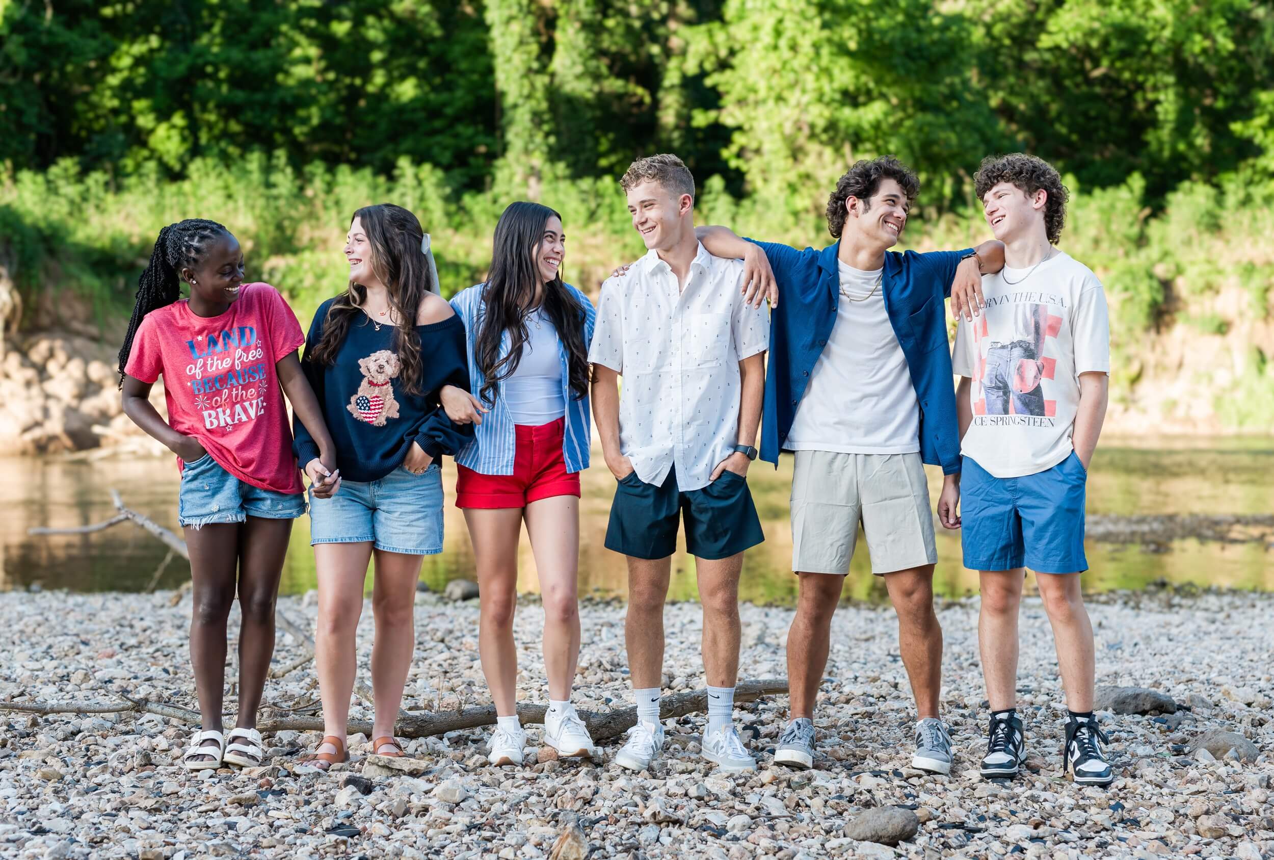 Example Shoot Title Tag Five high school senior friends hang out and laugh by a rocky riverbed