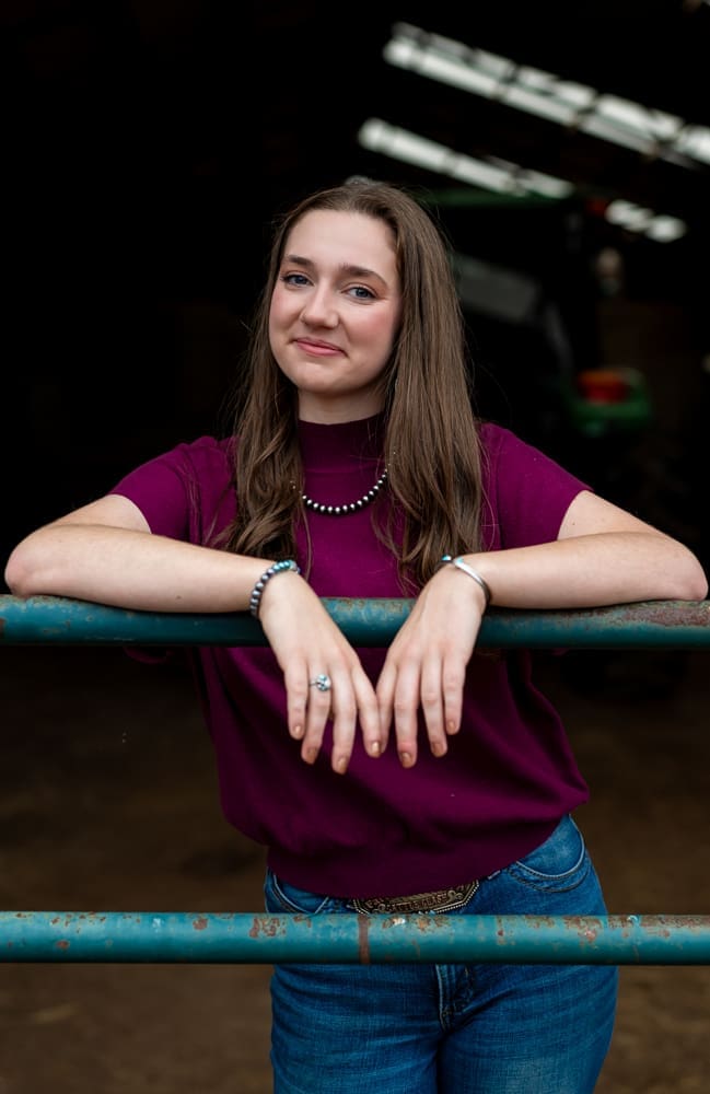 Senior girl taking Ag Pictures at farm